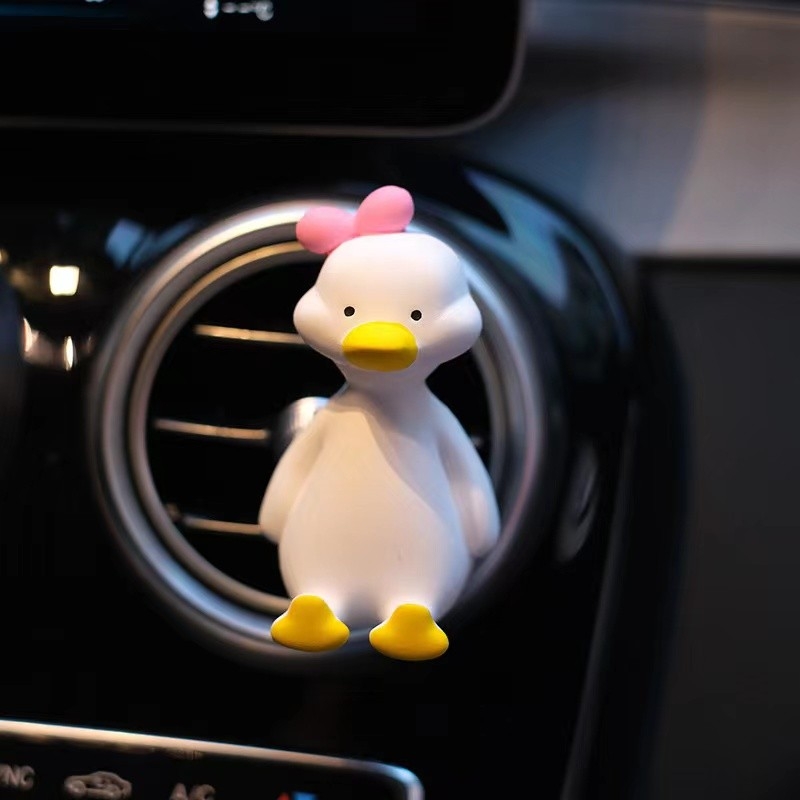 Car perfume car air conditioning outlet aromatherapy clip creative cute Internet celebrity duck car interior decoration collection female